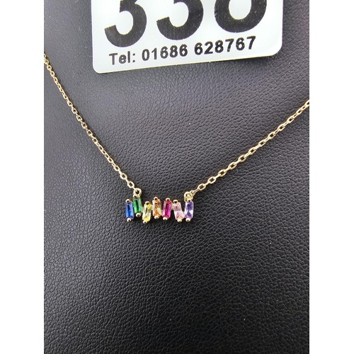 338 - An as new gold on 925 silver pretty necklace set with seven genuine baguette cut gemstones to includ... 