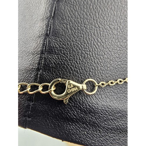 338 - An as new gold on 925 silver pretty necklace set with seven genuine baguette cut gemstones to includ... 