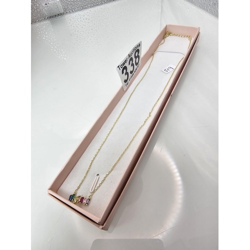 338 - An as new gold on 925 silver pretty necklace set with seven genuine baguette cut gemstones to includ... 