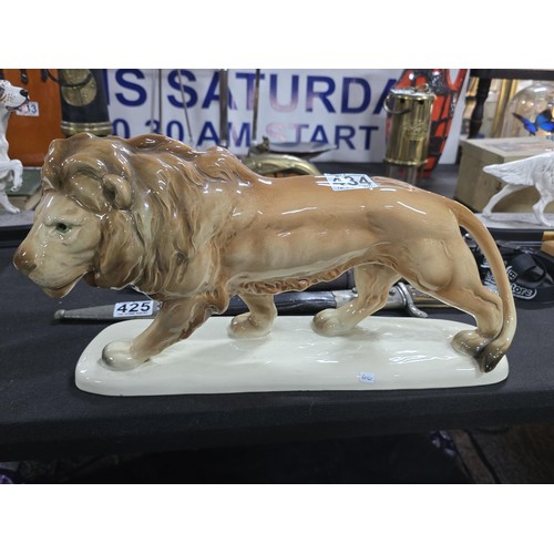 434 - A very large and impressive cortendorf West German ceramic lion sculpture, modelled walking with hea... 