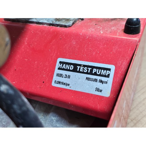 502 - Hand test pump kit for testing the pressure in central heating, model number 20-50, has a pressure r... 