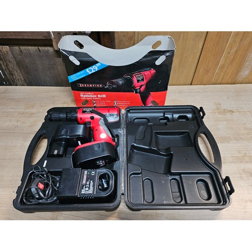 511 - Champion 18v cordless hammer drill 9647 complete with 2x batteries and charging dock - model SKU0075... 