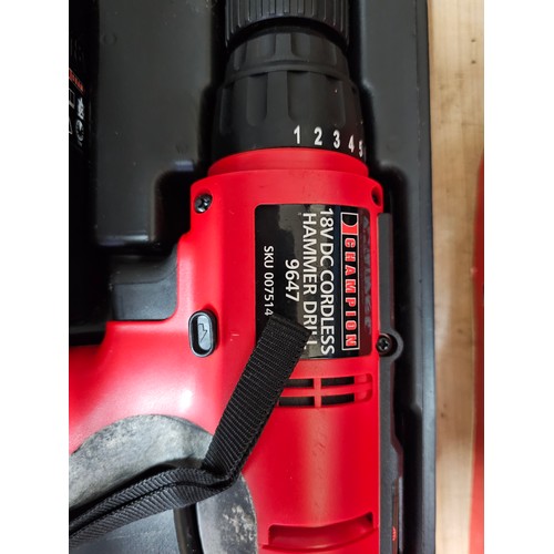 511 - Champion 18v cordless hammer drill 9647 complete with 2x batteries and charging dock - model SKU0075... 