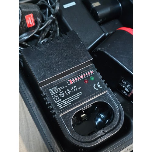 511 - Champion 18v cordless hammer drill 9647 complete with 2x batteries and charging dock - model SKU0075... 