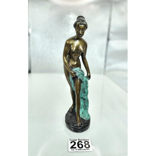 268 - A good solid bronze vintage figure of a classical nude lady holding a robe, the figure appears unsig... 