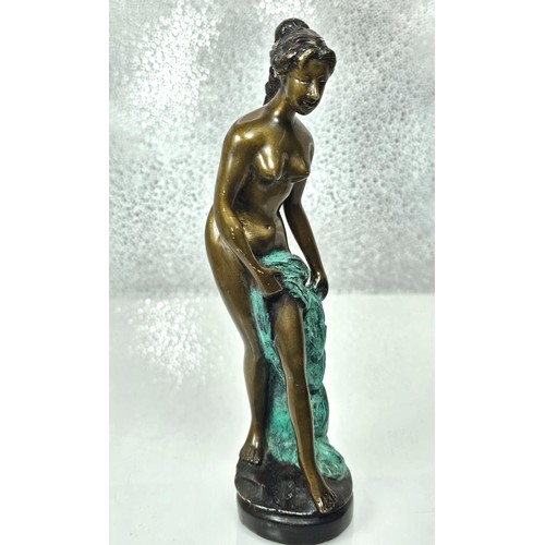 268 - A good solid bronze vintage figure of a classical nude lady holding a robe, the figure appears unsig... 