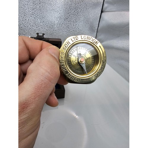 275 - A good modern brass reproduction compass marked Henry Hughes son ltd London 1941, the back is marked... 