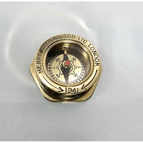 275 - A good modern brass reproduction compass marked Henry Hughes son ltd London 1941, the back is marked... 