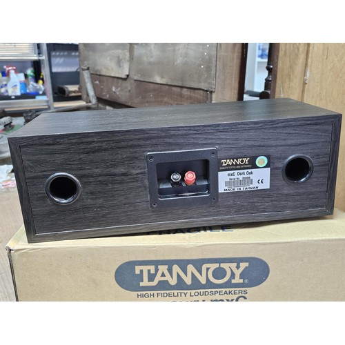 470 - A good quality Tannoy boxed speaker in a dark oak case in good order with original box and packing t... 