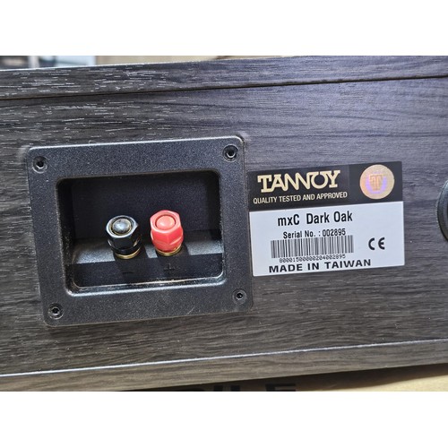 470 - A good quality Tannoy boxed speaker in a dark oak case in good order with original box and packing t... 