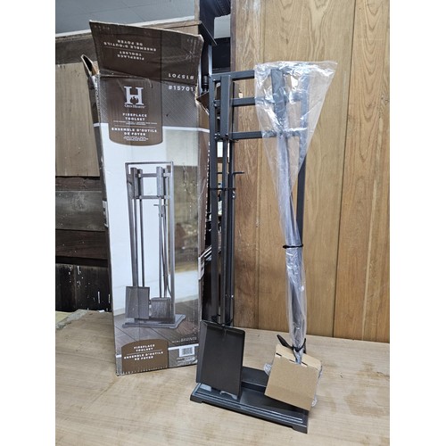 480 - A good quality boxed Open Hearth fireplace tool set / companion, made of hollow metal in brushed gre... 