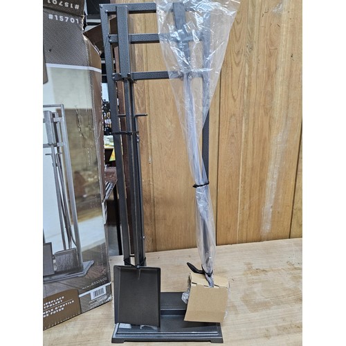 480 - A good quality boxed Open Hearth fireplace tool set / companion, made of hollow metal in brushed gre... 