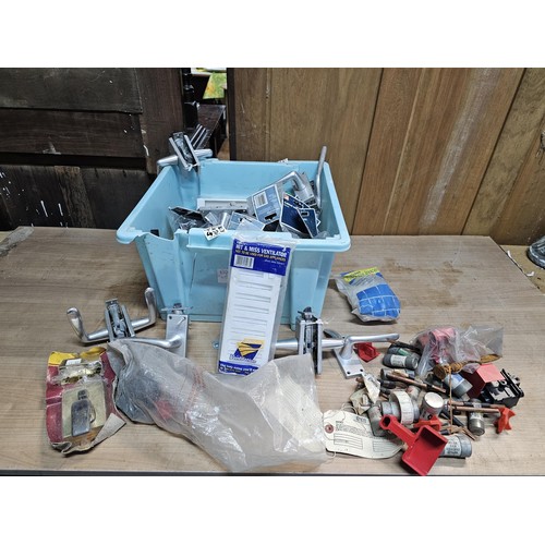 495 - A box containing a large quantity of assorted shed odds to include door handles and locks, main circ... 