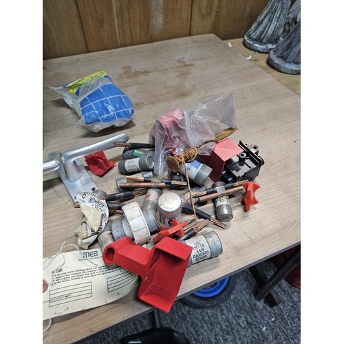 495 - A box containing a large quantity of assorted shed odds to include door handles and locks, main circ... 