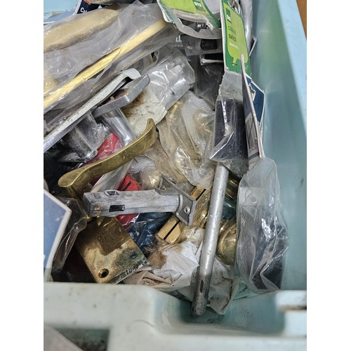 495 - A box containing a large quantity of assorted shed odds to include door handles and locks, main circ... 