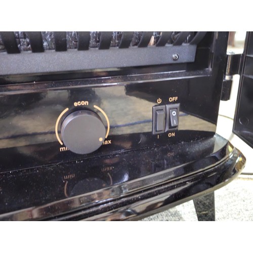 527 - Good quality dimplex electric heater complete with backlight and wood fire effect has 2x arched door... 