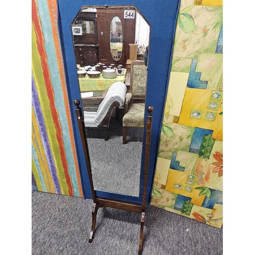 544 - A good quality vintage floor stand cheval mirror in an oak frame, with metal clips to hold the mirro... 