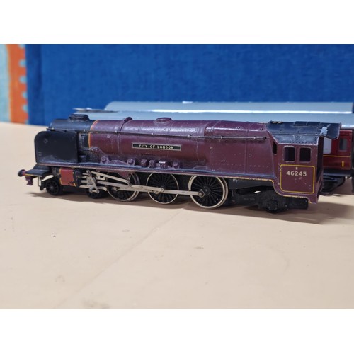 171 - A OO gauge City of London locomotive with the running number 46245, in need of attention along with ... 
