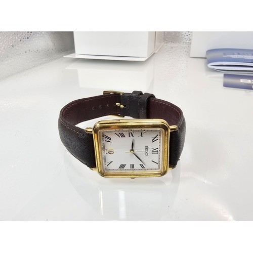 283 - A good quality Seiko V732-5A00 tank watch with date window, in full working order, (new replacement ... 