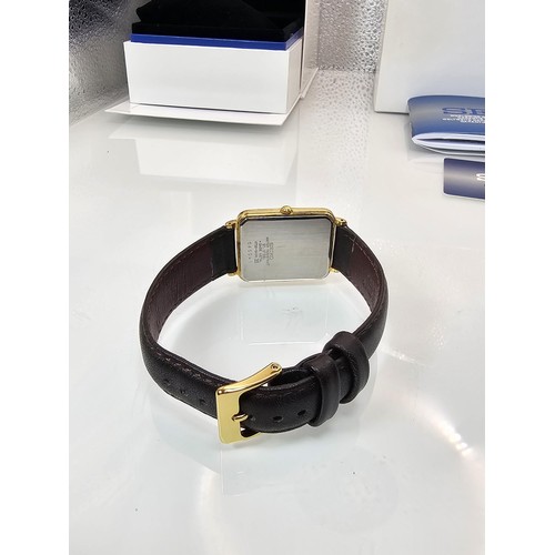 283 - A good quality Seiko V732-5A00 tank watch with date window, in full working order, (new replacement ... 