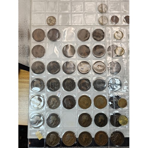285 - A coin album containing a large quantity of Victorian and later copper one penny coins and half penn... 