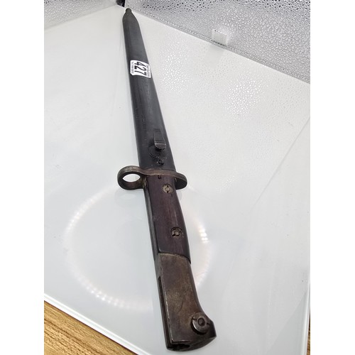 427 - A British WWI pattern 1907 bayonet straight Quillon type with single edged fullered blade, steel cro... 