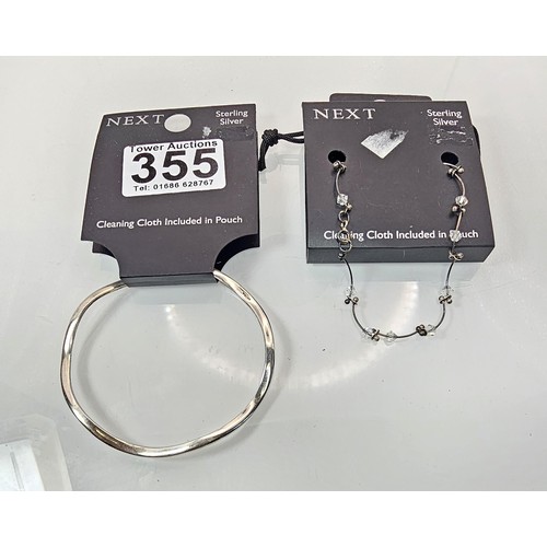 355 - A brand new Next sterling silver bangle with a wave shaped design along with a brand new Next sterli... 