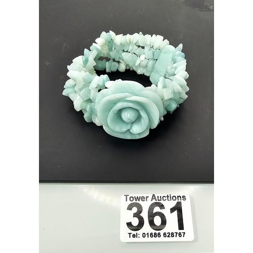 361 - An impressive carved amazonite (semi precious stone) beaded bracelet by Lola Rose. Featuring a well ... 