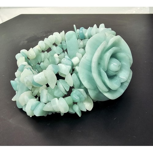 361 - An impressive carved amazonite (semi precious stone) beaded bracelet by Lola Rose. Featuring a well ... 