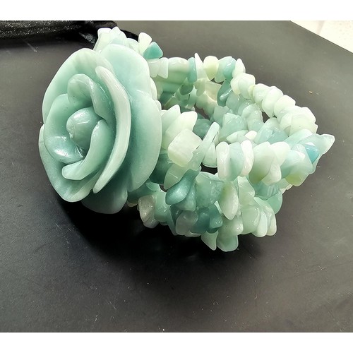 361 - An impressive carved amazonite (semi precious stone) beaded bracelet by Lola Rose. Featuring a well ... 