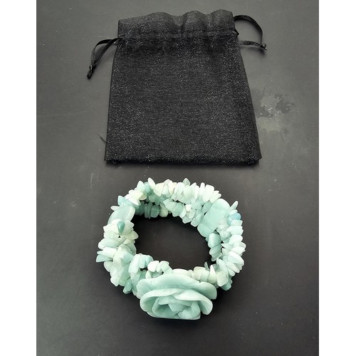 361 - An impressive carved amazonite (semi precious stone) beaded bracelet by Lola Rose. Featuring a well ... 