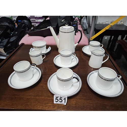 551 - A vintage Paragon 15 piece teaset in black and white with a garland design to the top, consisting of... 