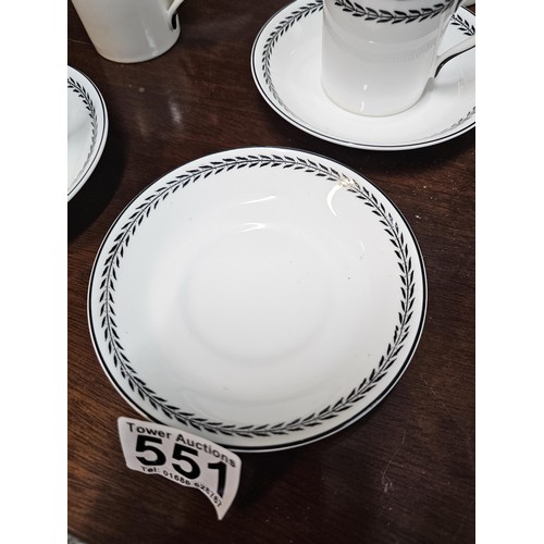 551 - A vintage Paragon 15 piece teaset in black and white with a garland design to the top, consisting of... 