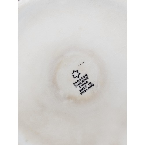 551 - A vintage Paragon 15 piece teaset in black and white with a garland design to the top, consisting of... 