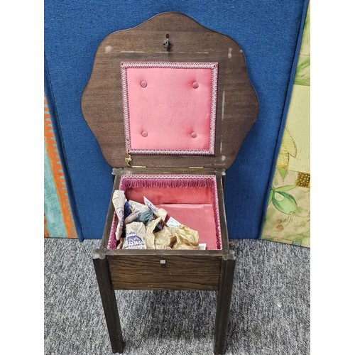 554 - A good quality vintage scalloped wooden sewing table with lift up lid in oak, the lid lifts to a fit... 