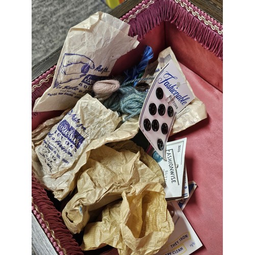 554 - A good quality vintage scalloped wooden sewing table with lift up lid in oak, the lid lifts to a fit... 