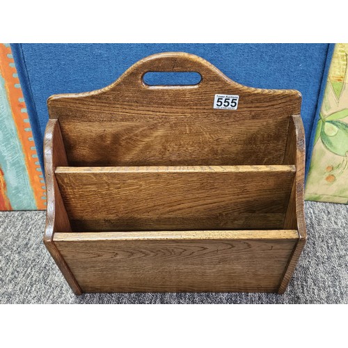 555 - A good quality vintage Taylor & Co, solid oak 4 division wine rack in good order showing little sign... 