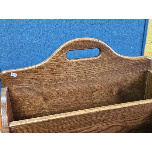 555 - A good quality vintage Taylor & Co, solid oak 4 division wine rack in good order showing little sign... 