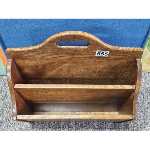 555 - A good quality vintage Taylor & Co, solid oak 4 division wine rack in good order showing little sign... 