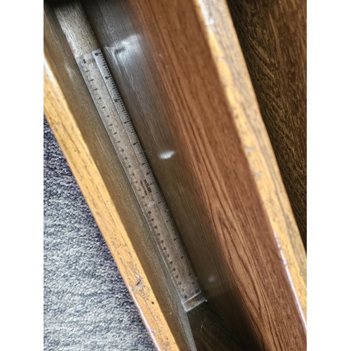 555 - A good quality vintage Taylor & Co, solid oak 4 division wine rack in good order showing little sign... 