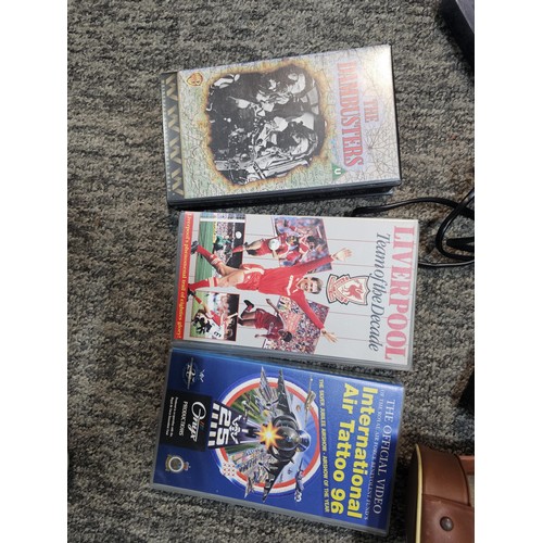 462 - A compact VHS portable video recorder complete with charger and spare tape, along with a  Agfa clack... 