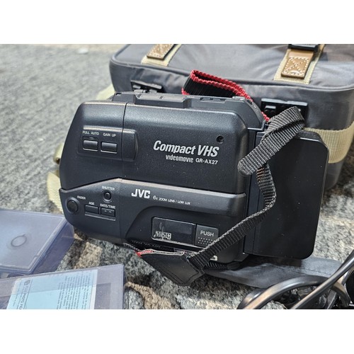 462 - A compact VHS portable video recorder complete with charger and spare tape, along with a  Agfa clack... 