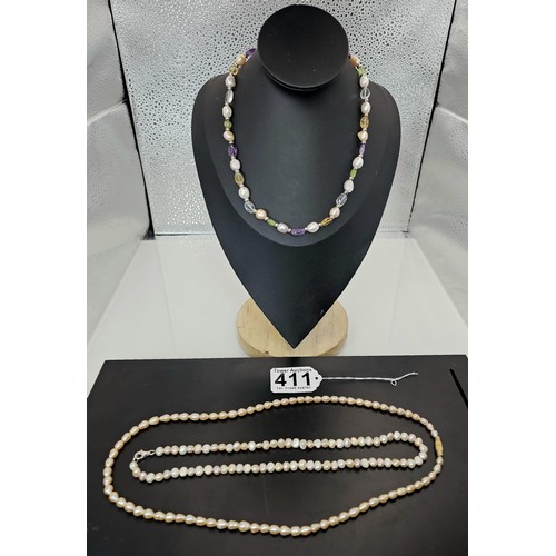 411 - 3x good quality freshwater pearl necklaces to include a pearl necklace with a 925 Silver clasp, a pe... 