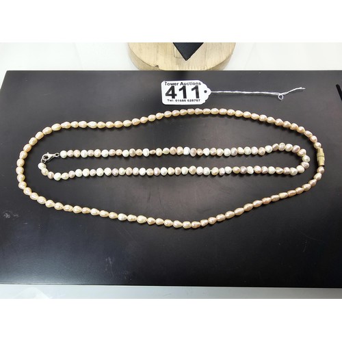 411 - 3x good quality freshwater pearl necklaces to include a pearl necklace with a 925 Silver clasp, a pe... 