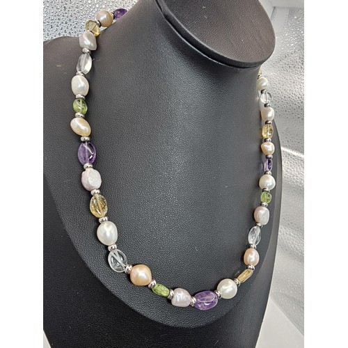 411 - 3x good quality freshwater pearl necklaces to include a pearl necklace with a 925 Silver clasp, a pe... 