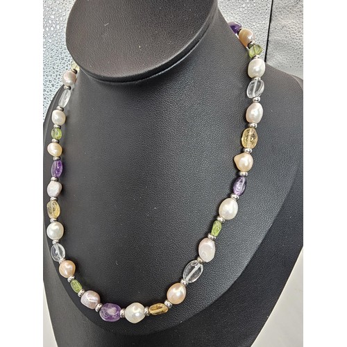 411 - 3x good quality freshwater pearl necklaces to include a pearl necklace with a 925 Silver clasp, a pe... 