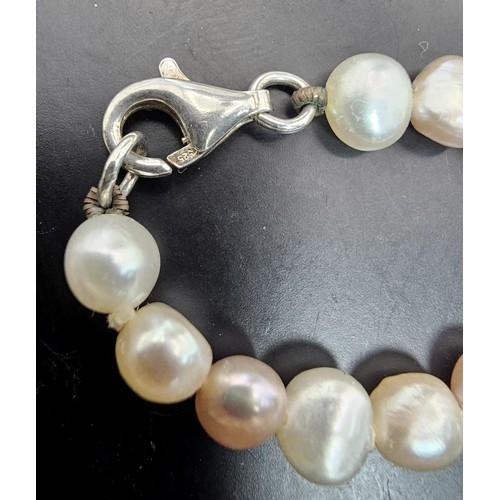 411 - 3x good quality freshwater pearl necklaces to include a pearl necklace with a 925 Silver clasp, a pe... 