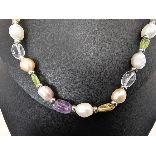 411 - 3x good quality freshwater pearl necklaces to include a pearl necklace with a 925 Silver clasp, a pe... 