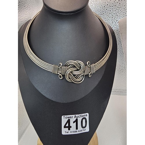 410 - Two good vintage jewellery items to include a stunning ornate white metal multi strand choker neckla... 