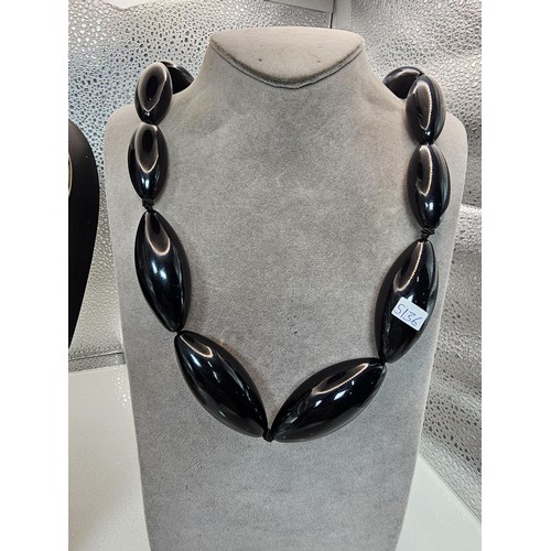 410 - Two good vintage jewellery items to include a stunning ornate white metal multi strand choker neckla... 